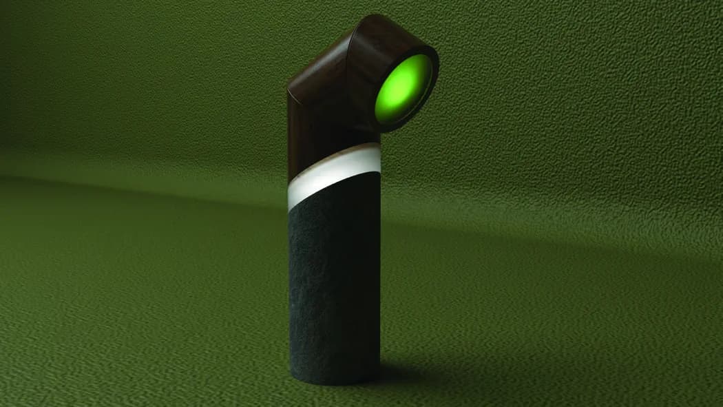 Small directional light render with green illuminated face.